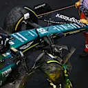 SPA, BELGIUM - JULY 29: The car of Lance Stroll of Canada and Aston Martin F1 Team is removed from the track after a crash during the Sprint Shootout ahead of the F1 Grand Prix of Belgium at Circuit de Spa-Francorchamps on July 29, 2023 in Spa, Belgium. (Photo by Dan Mullan/Getty Images)