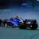 SAO PAULO, BRAZIL - NOVEMBER 05: Alexander Albon of Thailand driving the (23) Williams FW45 Mercedes spins off track after a collision with Kevin Magnussen of Denmark driving the (20) Haas F1 VF-23 Ferrari (not pictured) at the start during the F1 Grand Prix of Brazil at Autodromo Jose Carlos Pace on November 05, 2023 in Sao Paulo, Brazil. (Photo by Mark Thompson/Getty Images)