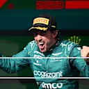 SAO PAULO, BRAZIL - NOVEMBER 05: Third placed Fernando Alonso of Spain and Aston Martin F1 Team celebrates on the podium during the F1 Grand Prix of Brazil at Autodromo Jose Carlos Pace on November 05, 2023 in Sao Paulo, Brazil. (Photo by Clive Mason - Formula 1/Formula 1 via Getty Images)