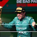 SAO PAULO, BRAZIL - NOVEMBER 05: Third placed Fernando Alonso of Spain and Aston Martin F1 Team celebrates on the podium during the F1 Grand Prix of Brazil at Autodromo Jose Carlos Pace on November 05, 2023 in Sao Paulo, Brazil. (Photo by Clive Mason - Formula 1/Formula 1 via Getty Images)