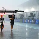 SAO PAULO, BRAZIL - NOVEMBER 03: Seventh placed qualifier Lando Norris of Great Britain and McLaren walks in the Pitlane during qualifying ahead of the F1 Grand Prix of Brazil at Autodromo Jose Carlos Pace on November 03, 2023 in Sao Paulo, Brazil. (Photo by Mark Thompson/Getty Images)