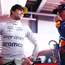 SAO PAULO, BRAZIL - NOVEMBER 03: Pole position qualifier Max Verstappen of the Netherlands and Oracle Red Bull Racing and third placed qualifier Lance Stroll of Canada and Aston Martin F1 Team talk in the FIA Garage after qualifying ahead of the F1 Grand Prix of Brazil at Autodromo Jose Carlos Pace on November 03, 2023 in Sao Paulo, Brazil. (Photo by Dan Istitene - Formula 1/Formula 1 via Getty Images)