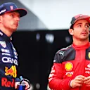 SAO PAULO, BRAZIL - NOVEMBER 03: Second placed qualifier Charles Leclerc of Monaco and Ferrari and Pole position qualifier Max Verstappen of the Netherlands and Oracle Red Bull Racing look on in the FIA Garage after qualifying ahead of the F1 Grand Prix of Brazil at Autodromo Jose Carlos Pace on November 03, 2023 in Sao Paulo, Brazil. (Photo by Dan Istitene - Formula 1/Formula 1 via Getty Images)