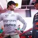 SAO PAULO, BRAZIL - NOVEMBER 03: Pole position qualifier Max Verstappen of the Netherlands and Oracle Red Bull Racing and third placed qualifier Lance Stroll of Canada and Aston Martin F1 Team talk in the FIA Garage after qualifying ahead of the F1 Grand Prix of Brazil at Autodromo Jose Carlos Pace on November 03, 2023 in Sao Paulo, Brazil. (Photo by Dan Istitene - Formula 1/Formula 1 via Getty Images)