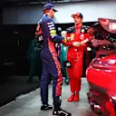 SAO PAULO, BRAZIL - NOVEMBER 03: Second placed qualifier Charles Leclerc of Monaco and Ferrari talks with Pole position qualifier Max Verstappen of the Netherlands and Oracle Red Bull Racing in the FIA Garage after qualifying ahead of the F1 Grand Prix of Brazil at Autodromo Jose Carlos Pace on November 03, 2023 in Sao Paulo, Brazil. (Photo by Dan Istitene - Formula 1/Formula 1 via Getty Images)
