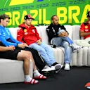 SAO PAULO, BRAZIL - NOVEMBER 02: Valtteri Bottas of Finland and Alfa Romeo F1, Logan Sargeant of United States and Williams, Charles Leclerc of Monaco and Ferrari, Lewis Hamilton of Great Britain and Mercedes and Carlos Sainz of Spain and Ferrari look on in the Drivers Press Conference during previews ahead of the F1 Grand Prix of Brazil at Autodromo Jose Carlos Pace on November 02, 2023 in Sao Paulo, Brazil. (Photo by Clive Mason/Getty Images)