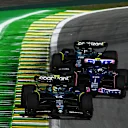 SAO PAULO, BRAZIL - NOVEMBER 04: Fernando Alonso of Spain driving the (14) Aston Martin AMR23 Mercedes leads Pierre Gasly of France driving the (10) Alpine F1 A523 Renault and Lance Stroll of Canada driving the (18) Aston Martin AMR23 Mercedes on track during the Sprint ahead of the F1 Grand Prix of Brazil at Autodromo Jose Carlos Pace on November 04, 2023 in Sao Paulo, Brazil. (Photo by Clive Mason - Formula 1/Formula 1 via Getty Images)