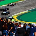 SAO PAULO, BRAZIL - NOVEMBER 04: Daniel Ricciardo of Australia driving the (3) Scuderia AlphaTauri AT04 leads Pierre Gasly of France driving the (10) Alpine F1 A523 Renault and Fernando Alonso of Spain driving the (14) Aston Martin AMR23 Mercedes on track during the Sprint ahead of the F1 Grand Prix of Brazil at Autodromo Jose Carlos Pace on November 04, 2023 in Sao Paulo, Brazil. (Photo by Mark Thompson/Getty Images)