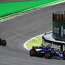 SAO PAULO, BRAZIL - NOVEMBER 04: Alexander Albon of Thailand driving the (23) Williams FW45 Mercedes leads Zhou Guanyu of China driving the (24) Alfa Romeo F1 C43 Ferrari and Logan Sargeant of United States driving the (2) Williams FW45 Mercedes on track during the Sprint ahead of the F1 Grand Prix of Brazil at Autodromo Jose Carlos Pace on November 04, 2023 in Sao Paulo, Brazil. (Photo by Clive Mason - Formula 1/Formula 1 via Getty Images)