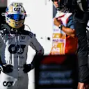 SAO PAULO, BRAZIL - NOVEMBER 04: 9th placed Daniel Ricciardo of Australia and Scuderia AlphaTauri looks on in parc ferme during the Sprint ahead of the F1 Grand Prix of Brazil at Autodromo Jose Carlos Pace on November 04, 2023 in Sao Paulo, Brazil. (Photo by Rudy Carezzevoli/Getty Images)