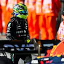 SAO PAULO, BRAZIL - NOVEMBER 04: 7th placed Lewis Hamilton of Great Britain and Mercedes walks in parc ferme during the Sprint ahead of the F1 Grand Prix of Brazil at Autodromo Jose Carlos Pace on November 04, 2023 in Sao Paulo, Brazil. (Photo by Rudy Carezzevoli/Getty Images)