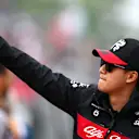 MONTREAL, QUEBEC - JUNE 18: Zhou Guanyu of China and Alfa Romeo F1 waves to the crowd on the drivers parade prior to the F1 Grand Prix of Canada at Circuit Gilles Villeneuve on June 18, 2023 in Montreal, Quebec. (Photo by Clive Mason/Getty Images)