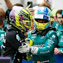MONTREAL, QUEBEC - JUNE 18: Second placed Fernando Alonso of Spain and Aston Martin F1 Team and Third placed Lewis Hamilton of Great Britain and Mercedes celebrate in parc ferme during the F1 Grand Prix of Canada at Circuit Gilles Villeneuve on June 18, 2023 in Montreal, Quebec. (Photo by Jared C. Tilton/Getty Images)
