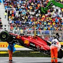 MONTREAL, QUEBEC - JUNE 17: The car of Carlos Sainz of Spain and Ferrari is recovered from the circuit after a crash during final practice ahead of the F1 Grand Prix of Canada at Circuit Gilles Villeneuve on June 17, 2023 in Montreal, Quebec. (Photo by Bryn Lennon - Formula 1/Formula 1 via Getty Images)