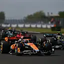 BUDAPEST, HUNGARY - JULY 23: Oscar Piastri of Australia driving the (81) McLaren MCL60 Mercedes leads Lewis Hamilton of Great Britain driving the (44) Mercedes AMG Petronas F1 Team W14 during the F1 Grand Prix of Hungary at Hungaroring on July 23, 2023 in Budapest, Hungary. (Photo by Dan Mullan/Getty Images)
