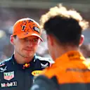BUDAPEST, HUNGARY - JULY 23: Race winner Max Verstappen of the Netherlands and Oracle Red Bull Racing and Second placed Lando Norris of Great Britain and McLaren talk in parc ferme during the F1 Grand Prix of Hungary at Hungaroring on July 23, 2023 in Budapest, Hungary. (Photo by Dan Istitene - Formula 1/Formula 1 via Getty Images)