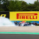 BUDAPEST, HUNGARY - JULY 21: Sergio Perez of Mexico driving the (11) Oracle Red Bull Racing RB19 crashes during practice ahead of the F1 Grand Prix of Hungary at Hungaroring on July 21, 2023 in Budapest, Hungary. (Photo by Bryn Lennon - Formula 1/Formula 1 via Getty Images)