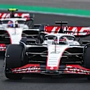 BUDAPEST, HUNGARY - JULY 21: Kevin Magnussen of Denmark driving the (20) Haas F1 VF-23 Ferrari leads Nico Hulkenberg of Germany driving the (27) Haas F1 VF-23 Ferrari during practice ahead of the F1 Grand Prix of Hungary at Hungaroring on July 21, 2023 in Budapest, Hungary. (Photo by Bryn Lennon - Formula 1/Formula 1 via Getty Images)