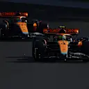 BUDAPEST, HUNGARY - JULY 22: Lando Norris of Great Britain driving the (4) McLaren MCL60 Mercedes leads Oscar Piastri of Australia driving the (81) McLaren MCL60 Mercedes on track during qualifying ahead of the F1 Grand Prix of Hungary at Hungaroring on July 22, 2023 in Budapest, Hungary. (Photo by Bryn Lennon - Formula 1/Formula 1 via Getty Images)