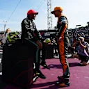 BUDAPEST, HUNGARY - JULY 22: Pole position qualifier Lewis Hamilton of Great Britain and Mercedes and Third placed qualifier Lando Norris of Great Britain and McLaren talk in parc ferme during qualifying ahead of the F1 Grand Prix of Hungary at Hungaroring on July 22, 2023 in Budapest, Hungary. (Photo by Mario Renzi - Formula 1/Formula 1 via Getty Images)