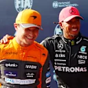 BUDAPEST, HUNGARY - JULY 22: Pole position qualifier Lewis Hamilton of Great Britain and Mercedes celebrates in parc ferme with third placed qualifier Lando Norris of Great Britain and McLaren during qualifying ahead of the F1 Grand Prix of Hungary at Hungaroring on July 22, 2023 in Budapest, Hungary. (Photo by Dan Istitene - Formula 1/Formula 1 via Getty Images)