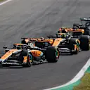 MONZA, ITALY - SEPTEMBER 03: Oscar Piastri of Australia driving the (81) McLaren MCL60 Mercedes leads Lando Norris of Great Britain driving the (4) McLaren MCL60 Mercedes during the F1 Grand Prix of Italy at Autodromo Nazionale Monza on September 03, 2023 in Monza, Italy. (Photo by Ryan Pierse/Getty Images)