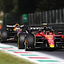 MONZA, ITALY - SEPTEMBER 03: Carlos Sainz of Spain driving (55) the Ferrari SF-23 leads Max Verstappen of the Netherlands driving the (1) Oracle Red Bull Racing RB19 during the F1 Grand Prix of Italy at Autodromo Nazionale Monza on September 03, 2023 in Monza, Italy. (Photo by Peter Fox/Getty Images)
