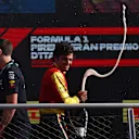 MONZA, ITALY - SEPTEMBER 03: Third placed Carlos Sainz of Spain and Ferrari celebrates on the podium during the F1 Grand Prix of Italy at Autodromo Nazionale Monza on September 03, 2023 in Monza, Italy. (Photo by Ryan Pierse/Getty Images)