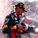 MONZA, ITALY - SEPTEMBER 03: Race winner Max Verstappen of the Netherlands and Oracle Red Bull Racing celebrates on the podium during the F1 Grand Prix of Italy at Autodromo Nazionale Monza on September 03, 2023 in Monza, Italy. (Photo by Dan Istitene - Formula 1/Formula 1 via Getty Images)
