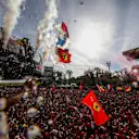 MONZA, ITALY - SEPTEMBER 03: The tifosi celebrate with Max Verstappen of Red Bull Racing and The Netherlands, Sergio Perez of Mexico and Red Bull Racing and Carlos Sainz of Ferrari and Spain during the F1 Grand Prix of Italy at Autodromo Nazionale Monza on September 03, 2023 in Monza, Italy. (Photo by Peter Fox/Getty Images)