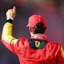 MONZA, ITALY - SEPTEMBER 02: Third placed Charles Leclerc of Monaco and Ferrari waves to the crowd from parc ferme during qualifying ahead of the F1 Grand Prix of Italy at Autodromo Nazionale Monza on September 02, 2023 in Monza, Italy. (Photo by Dan Istitene - Formula 1/Formula 1 via Getty Images)