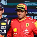 MONZA, ITALY - SEPTEMBER 02: Pole position qualifier Carlos Sainz of Spain and Ferrari, Second placed qualifier Max Verstappen of the Netherlands and Oracle Red Bull Racing and Third placed qualifier Charles Leclerc of Monaco and Ferrari pose for a photo in parc ferme during qualifying ahead of the F1 Grand Prix of Italy at Autodromo Nazionale Monza on September 02, 2023 in Monza, Italy. (Photo by Dan Istitene - Formula 1/Formula 1 via Getty Images)