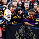 SUZUKA, JAPAN - SEPTEMBER 24: Race winner Max Verstappen of the Netherlands and Oracle Red Bull Racing and his team celebrate their Constructors' Championship win in parc ferme during the F1 Grand Prix of Japan at Suzuka International Racing Course on September 24, 2023 in Suzuka, Japan. (Photo by Rudy Carezzevoli/Getty Images)