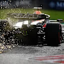 SUZUKA, JAPAN - SEPTEMBER 23: Sparks fly behind Max Verstappen of the Netherlands driving the (1) Oracle Red Bull Racing RB19 during qualifying ahead of the F1 Grand Prix of Japan at Suzuka International Racing Course on September 23, 2023 in Suzuka, Japan. (Photo by Clive Mason/Getty Images)