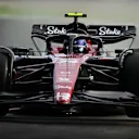 SUZUKA, JAPAN - SEPTEMBER 23: Zhou Guanyu of China driving the (24) Alfa Romeo F1 C43 Ferrari on track during qualifying ahead of the F1 Grand Prix of Japan at Suzuka International Racing Course on September 23, 2023 in Suzuka, Japan. (Photo by Clive Mason/Getty Images)