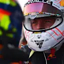 SUZUKA, JAPAN - SEPTEMBER 23: Pole position qualifier Max Verstappen of the Netherlands and Oracle Red Bull Racing talks with second placed qualifier Oscar Piastri of Australia and McLaren in parc ferme during qualifying ahead of the F1 Grand Prix of Japan at Suzuka International Racing Course on September 23, 2023 in Suzuka, Japan. (Photo by Mario Renzi - Formula 1/Formula 1 via Getty Images)