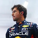 LAS VEGAS, NEVADA - NOVEMBER 18: Twelfth placed qualifier Sergio Perez of Mexico and Oracle Red Bull Racing looks on in the FIA Garage after qualifying ahead of the F1 Grand Prix of Las Vegas at Las Vegas Strip Circuit on November 18, 2023 in Las Vegas, Nevada. (Photo by Dan Istitene - Formula 1/Formula 1 via Getty Images)