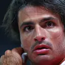 LAS VEGAS, NEVADA - NOVEMBER 18: Second placed qualifier Carlos Sainz of Spain and Ferrari looks on in parc ferme after qualifying ahead of the F1 Grand Prix of Las Vegas at Las Vegas Strip Circuit on November 18, 2023 in Las Vegas, Nevada. (Photo by Dan Istitene - Formula 1/Formula 1 via Getty Images)