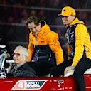 LAS VEGAS, NEVADA - NOVEMBER 18: Oscar Piastri of Australia and McLaren and Lando Norris of Great Britain and McLaren look on prior to the F1 Grand Prix of Las Vegas at Las Vegas Strip Circuit on November 18, 2023 in Las Vegas, Nevada. (Photo by Chris Graythen/Getty Images)