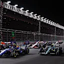 LAS VEGAS, NEVADA - NOVEMBER 18: Logan Sargeant of United States driving the (2) Williams FW45 Mercedes leads Fernando Alonso of Spain driving the (14) Aston Martin AMR23 Mercedes on track during the F1 Grand Prix of Las Vegas at Las Vegas Strip Circuit on November 18, 2023 in Las Vegas, Nevada. (Photo by Dan Istitene - Formula 1/Formula 1 via Getty Images)