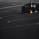 LAS VEGAS, NEVADA - NOVEMBER 18: Daniel Ricciardo of Australia driving the (3) Scuderia AlphaTauri AT04 on track during the F1 Grand Prix of Las Vegas at Las Vegas Strip Circuit on November 18, 2023 in Las Vegas, Nevada. (Photo by Rudy Carezzevoli/Getty Images)