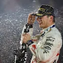 LAS VEGAS, NEVADA - NOVEMBER 18: Race winner Max Verstappen of the Netherlands and Oracle Red Bull Racing celebrates on the podium during the F1 Grand Prix of Las Vegas at Las Vegas Strip Circuit on November 18, 2023 in Las Vegas, Nevada. (Photo by Chris Graythen/Getty Images)