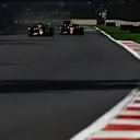 MEXICO CITY, MEXICO - OCTOBER 29: Max Verstappen of the Netherlands driving the (1) Oracle Red Bull Racing RB19 overtakes Carlos Sainz of Spain driving (55) the Ferrari SF-23 during the F1 Grand Prix of Mexico at Autodromo Hermanos Rodriguez on October 29, 2023 in Mexico City, Mexico. (Photo by Mark Thompson/Getty Images)