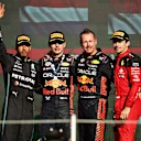 MEXICO CITY, MEXICO - OCTOBER 29: Race winner Max Verstappen of the Netherlands and Oracle Red Bull Racing, Second placed Lewis Hamilton of Great Britain and Mercedes, Third placed Charles Leclerc of Monaco and Ferrari  and Richard Wolverson of Red Bull Racing celebrate on the podium after the F1 Grand Prix of Mexico at Autodromo Hermanos Rodriguez on October 29, 2023 in Mexico City, Mexico. (Photo by Jared C. Tilton/Getty Images)