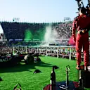 MEXICO CITY, MEXICO - OCTOBER 29: Race winner Max Verstappen of the Netherlands and Oracle Red Bull Racing, Second placed Lewis Hamilton of Great Britain and Mercedes, Third placed Charles Leclerc of Monaco and Ferrari  and Richard Wolverson of Red Bull Racing celebrate on the podium after the F1 Grand Prix of Mexico at Autodromo Hermanos Rodriguez on October 29, 2023 in Mexico City, Mexico. (Photo by Mario Renzi - Formula 1/Formula 1 via Getty Images)