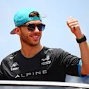 MIAMI, FLORIDA - MAY 07: Pierre Gasly of France and Alpine F1 waves to the crowd on the drivers parade prior to to the F1 Grand Prix of Miami at Miami International Autodrome on May 07, 2023 in Miami, Florida. (Photo by Clive Mason - Formula 1/Formula 1 via Getty Images)