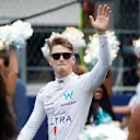 MIAMI, FLORIDA - MAY 07: Logan Sargeant of United States and Williams waves to the crowd from the grid prior to the F1 Grand Prix of Miami at Miami International Autodrome on May 07, 2023 in Miami, Florida. (Photo by Jared C. Tilton/Getty Images)