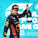 MIAMI, FLORIDA - MAY 07: Second placed Sergio Perez of Mexico and Oracle Red Bull Racing celebrates on the podium during the F1 Grand Prix of Miami at Miami International Autodrome on May 07, 2023 in Miami, Florida. (Photo by Mark Thompson/Getty Images)