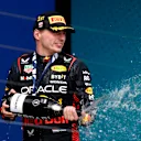 MIAMI, FLORIDA - MAY 07: Race winner Max Verstappen of the Netherlands and Oracle Red Bull Racing celebrates on the podium during the F1 Grand Prix of Miami at Miami International Autodrome on May 07, 2023 in Miami, Florida. (Photo by Chris Graythen/Getty Images)