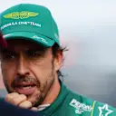 MIAMI, FLORIDA - MAY 06: Second placed qualifier Fernando Alonso of Spain and Aston Martin F1 Team and Pole position qualifier Sergio Perez of Mexico and Oracle Red Bull Racing talk in parc ferme during qualifying ahead of the F1 Grand Prix of Miami at Miami International Autodrome on May 06, 2023 in Miami, Florida. (Photo by Mario Renzi - Formula 1/Formula 1 via Getty Images)